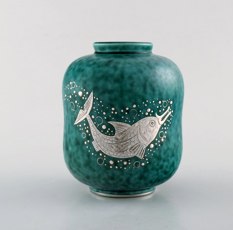 Wilhelm Kåge for Gustavsberg. Argenta vase in glazed ceramics with silver inlaid 
fish. Sweden 1940