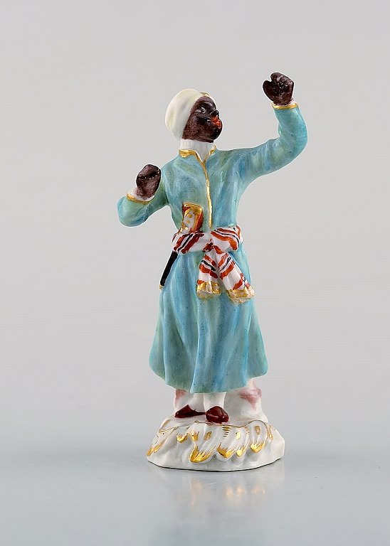 Rare antique Meissen miniature figure after Johann Joachim Kändler in 
hand-painted porcelain. Blackamoor. Dated 1850-80.
