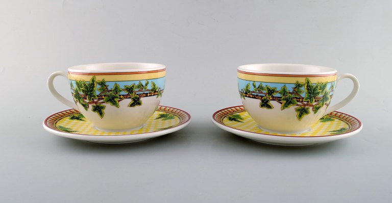 Gianni Versace for Rosenthal. Two "Ivy Leaves Passion" cups with saucers. Late 
20th century.
