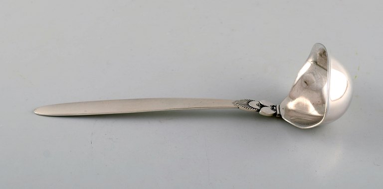 Large Georg Jensen "Cactus" sauce spoon in sterling silver. Dated 1915-30.
