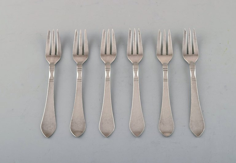 Georg Jensen Continental cutlery. Six cake forks in hammered sterling silver.
