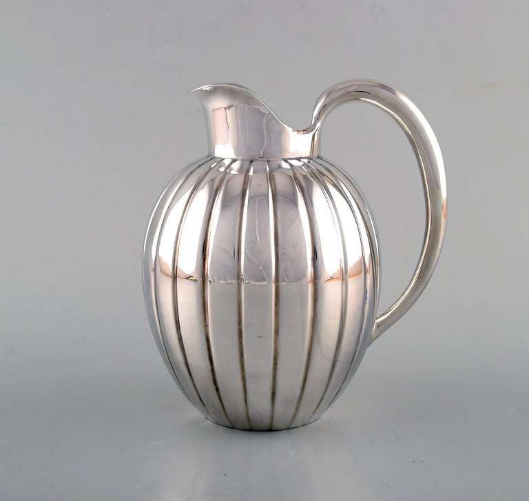 Georg Jensen art deco sterling silver jug in fluted style, model number 856.
