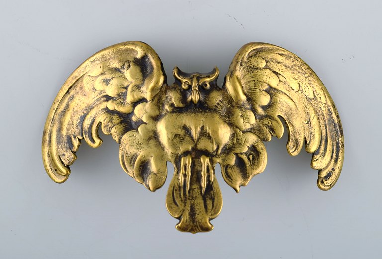 René Lalique, France. Early and rare art nouveau bronze pendant. Owl with 
outstretched wings. 1910