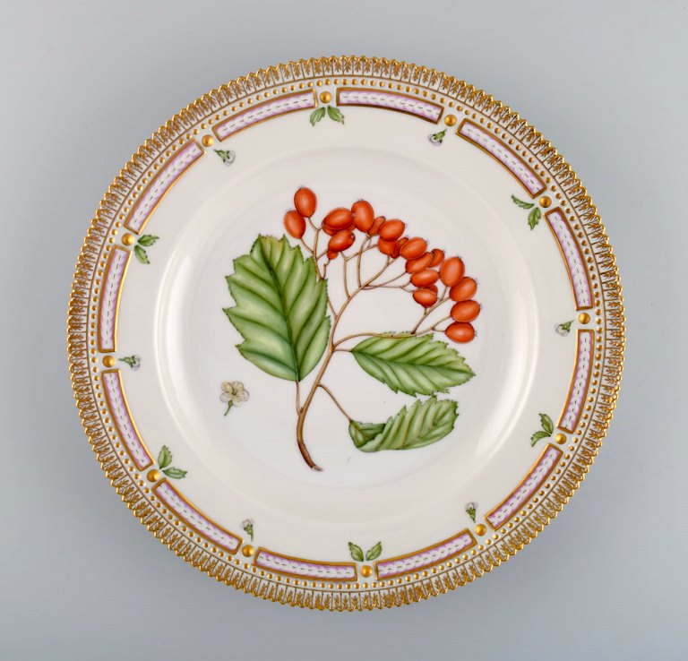 Royal Copenhagen Flora Danica dinner plate in hand-painted porcelain with 
flowers and gold decoration. Model number 20/3549.
