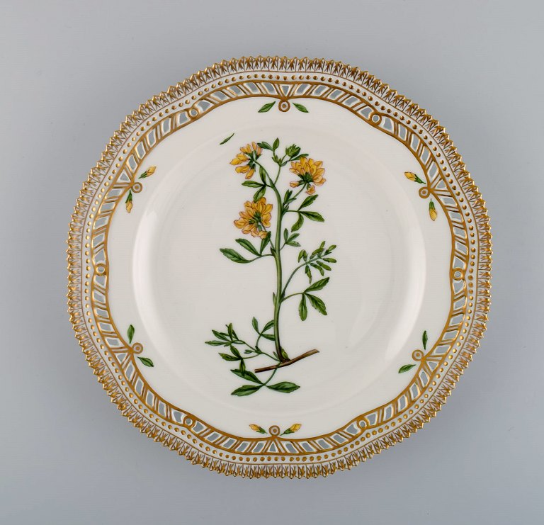 Royal Copenhagen Flora Danica openwork plate in hand-painted porcelain with 
flowers and gold decoration. Model number 20/3554.
