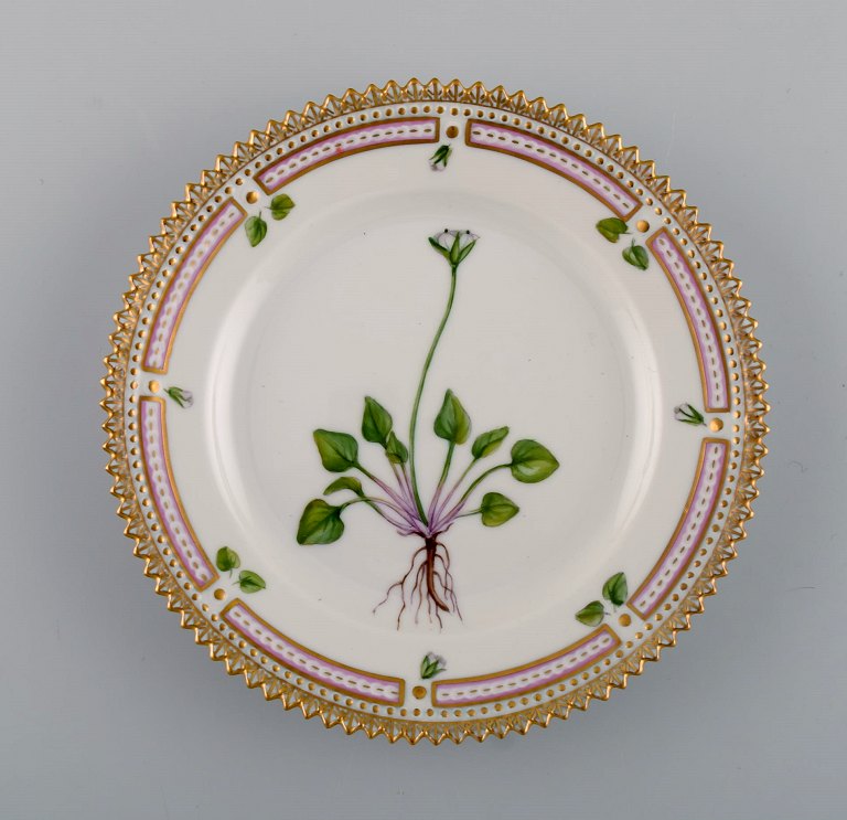 Royal Copenhagen Flora Danica side plate in hand-painted porcelain with flowers 
and gold decoration. Model number 20/3552.
