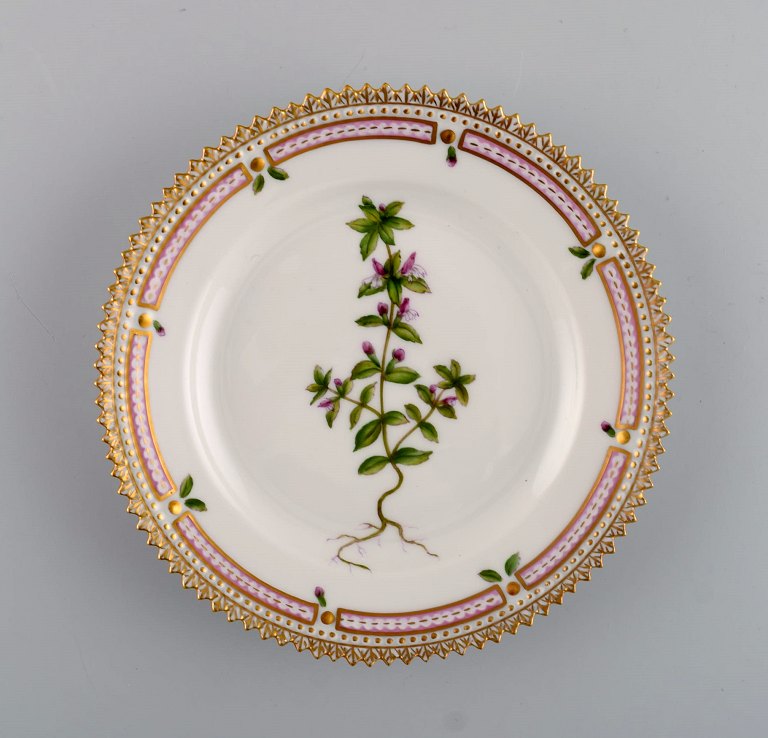 Royal Copenhagen Flora Danica side plate in hand-painted porcelain with flowers 
and gold decoration. Model number 20/3552.
