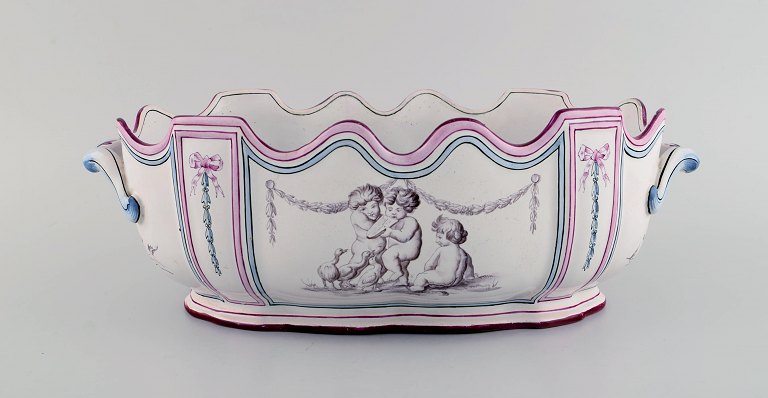 Emile Gallé for St. Clement, Nancy. Antique Monteith / punch bowl with handles 
in hand-painted faience decorated with young boys and ducks. Museum quality. 
1870 / 80s.

