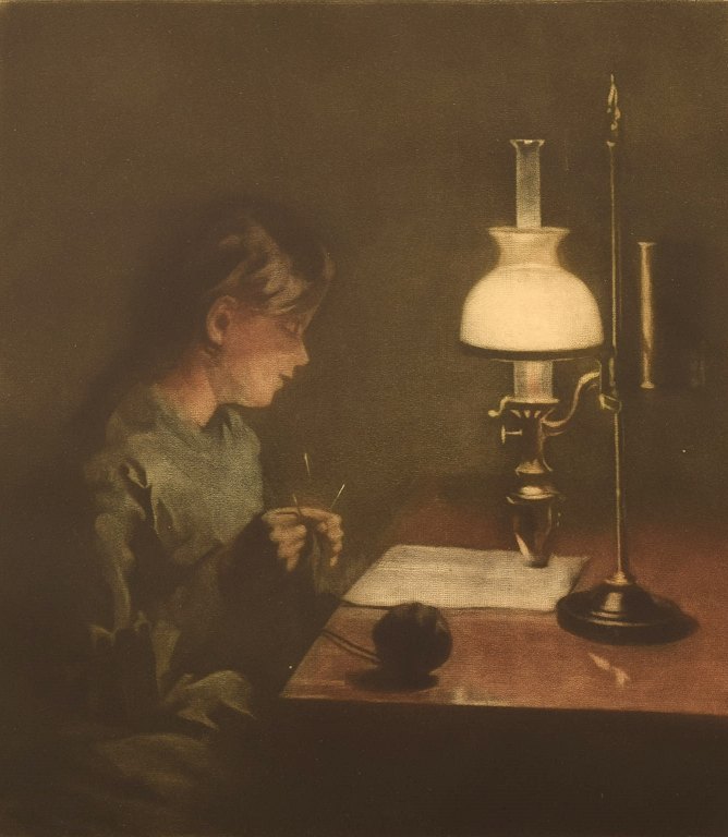 Peter Ilsted (1861-1933). Mezzotint in colors. Interior with young knitting 
woman. Approx. 1900.
