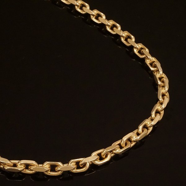 An 14kt gold anchor necklace. 1,2x0,7cm. W: 160,3gr. L: 71cm