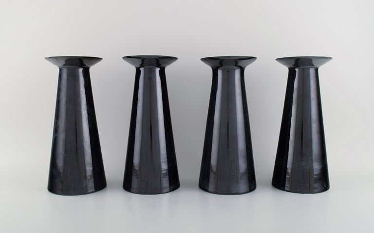 Stölzle-Oberglas, Austria. Four Beatrice and Nora vases in black art glass. 
White interior. 1980s.
