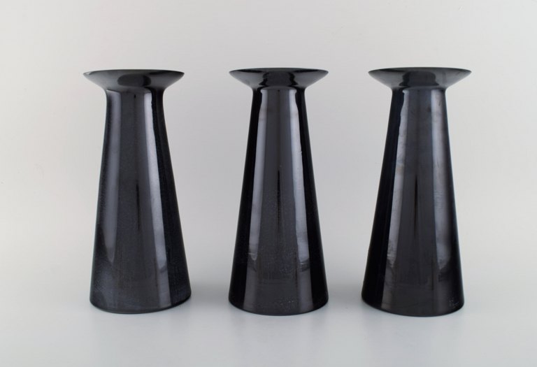 Stölzle-Oberglas, Austria. Three Beatrice and Nora vases in black art glass. 
White interior. 1980s.
