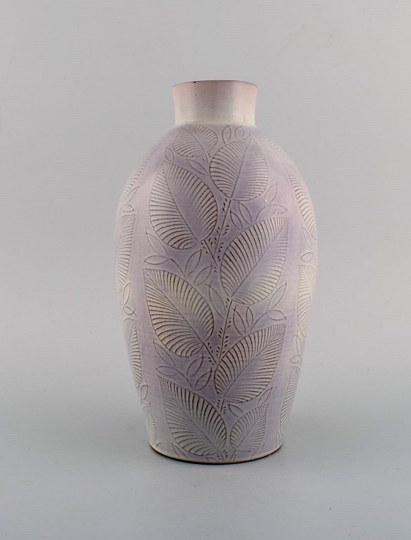 Nils Thorsson for Royal Copenhagen. Vase in glazed ceramics with leaf 
decoration. Dated 1944.
