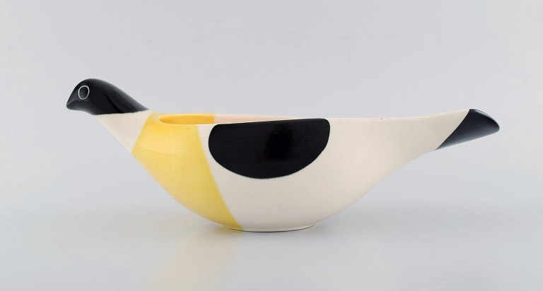 Nils Thorsson for Aluminia. Large Columbine bowl in hand-painted glazed faience. 
White, black and yellow bird. Model number 2749. Mid 20th century.
