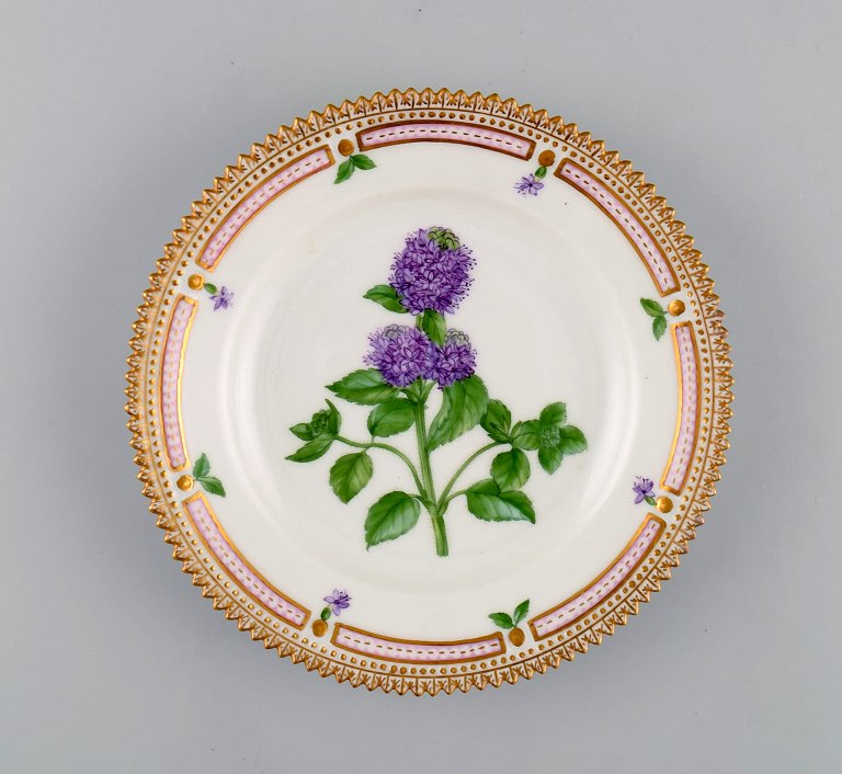 Royal Copenhagen Flora Danica dessert plate in hand-painted porcelain with 
flowers and gold decoration. Model number 20/3551.
