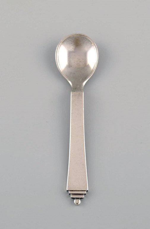 Georg Jensen Pyramid salt spoon in sterling silver. Dated 1933-44.
