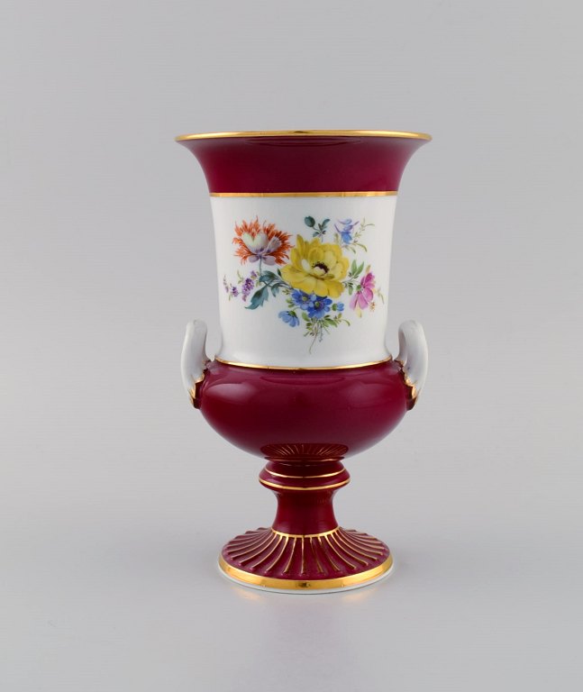 Antique Meissen porcelain vase with hand-painted flowers. Purple and gold 
decoration. Ca. 1900.
