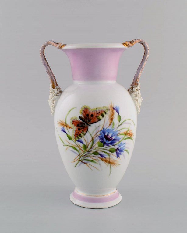 Antique Bing & Grøndahl porcelain vase with hand-painted butterflies and 
flowers. Handles modeled as snakes from Medusa
