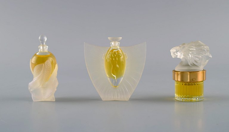 Three Lalique perfume bottles. Late 20th century.
