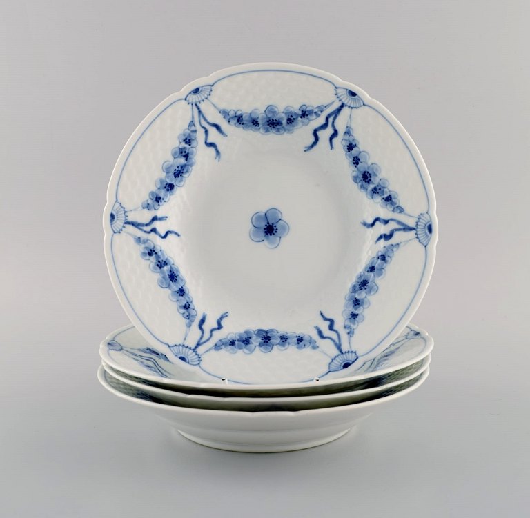 Four Bing & Grøndahl Empire deep plates. Mid-20th century.
