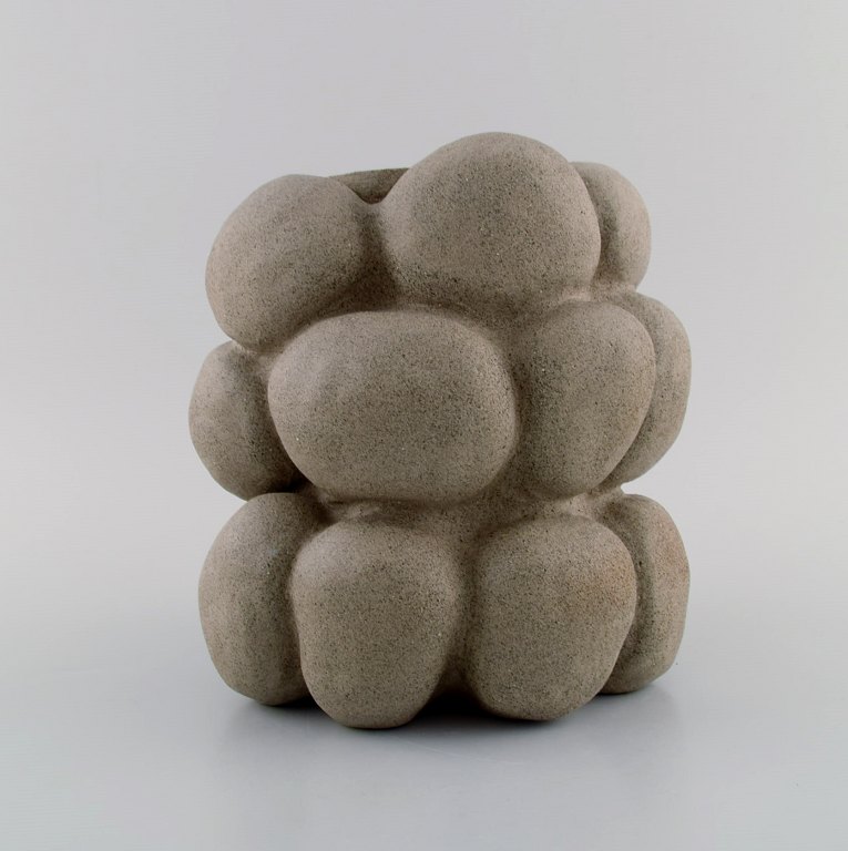 Christina Muff, Danish contemporary ceramicist (b. 1971). Sculptural unique vase 
in stoneware. unglazed outside, white glossy glaze inside.
