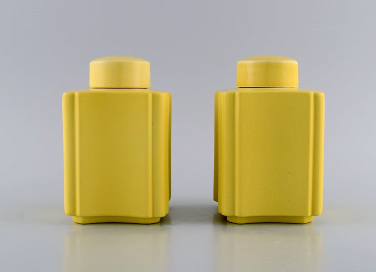 Wilhelm Kåge (1889-1960) for Gustavsberg. A pair of rare art deco tea caddies in 
yellow glazed stoneware. 1920s / 30s.
