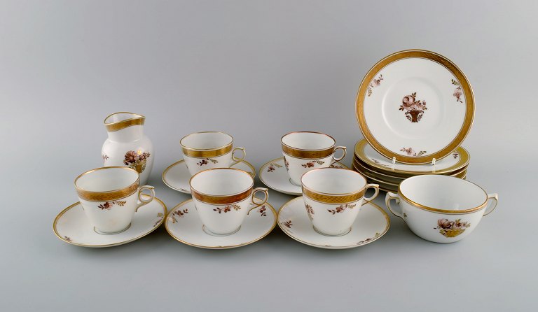 Royal Copenhagen Golden Basket coffee service for five people.
