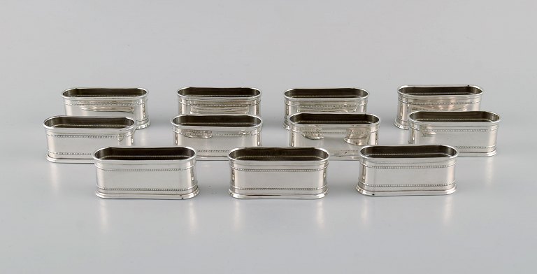 11 Sener napkin rings in silver (900) with beaded border. Turkey, 1930s / 40s.
