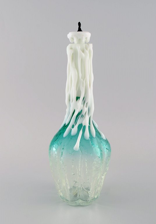 Rare Murano decanter in mouth blown art glass shaped like a candle in a bottle. 
Italian design, 1960s / 70s.
