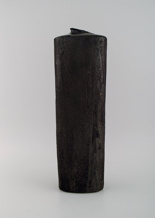 European studio ceramicist. Large unique vase in glazed stoneware. Beautiful 
glaze in black and metallic shades. 1960s / 70s.
