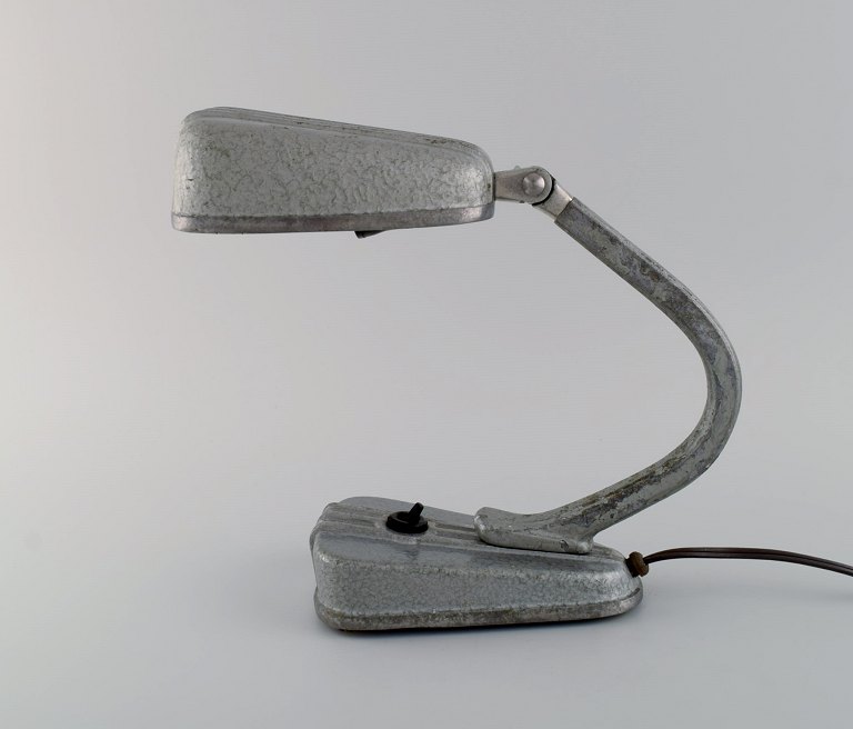 Rare art deco desk lamp in original metallic lacquer. Mid-20th century. 
Industrial design, mid 20th century.
