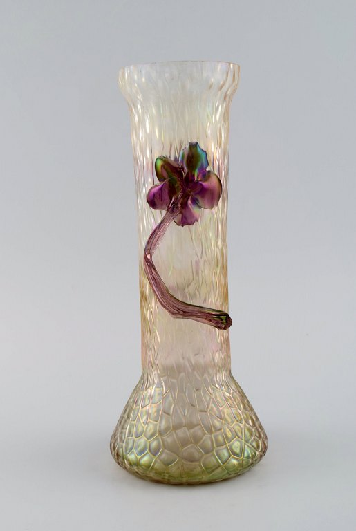 Lötz art nouveau vase in frosted mouth-blown art glass with purple flowers in 
relief. Approx. 1900.
