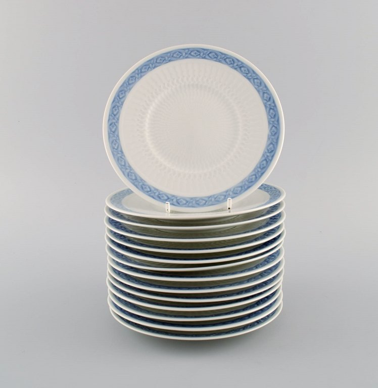 14 Royal Copenhagen Blue Fan side plates. 1960s. Model number 1212/1522. 
Designed by Arnold Krog in 1909.
