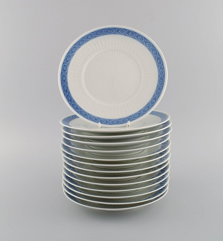 14 Royal Copenhagen Blue Fan lunch plates. 1960s / 70s. Model number 1212/11521. 
Designed by Arnold Krog in 1909.
