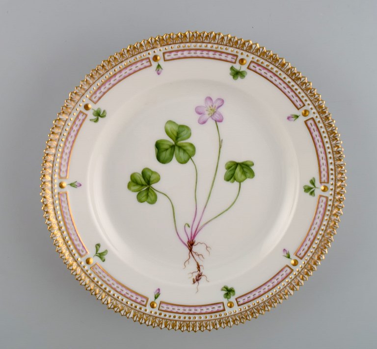 Royal Copenhagen Flora Danica salad plate in hand-painted porcelain with flowers 
and gold decoration. Model number 20/3573.
