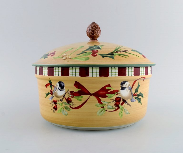 Catherine McClung for Lenox. "Winter greetings everyday". Large lidded tureen in 
glazed stoneware decorated with mistletoe, birds and red ribbon. Lid knob 
modeled as a fir cone. Approx. 2000.
