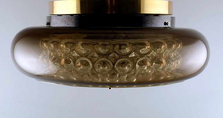 Carl Fagerlund for Orrefors. "Bubblan" ceiling lamp in smoked and clear art 
glass. Brass mounting. Swedish design, 1970s.