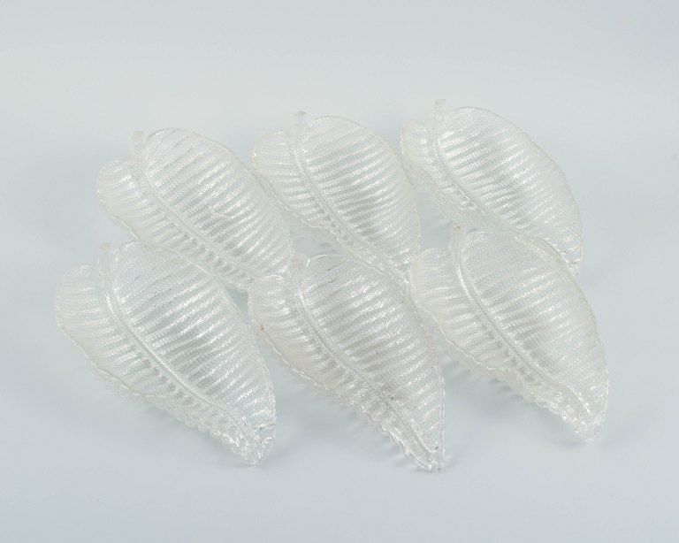 A set of six art glass leaf-shaped bowls.