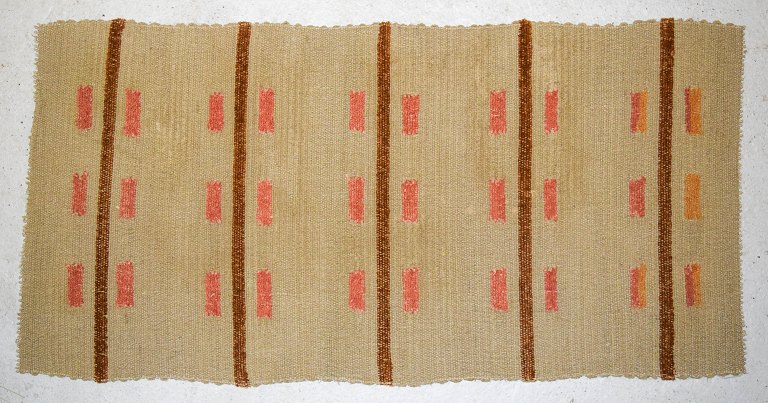 Swedish textile designer, handwoven carpet in wool.Modern design with geometric pattern.
