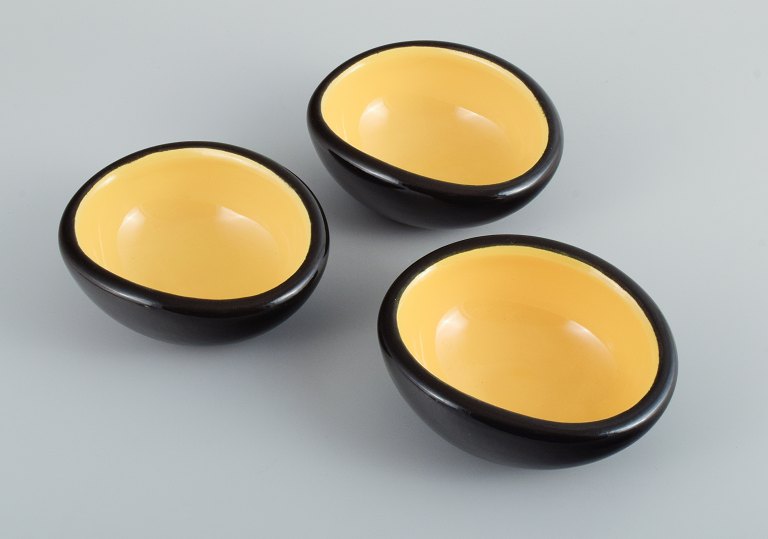 Keramos, Sèvres, France.
3 unique ceramic bowls glazed in yellow and black.