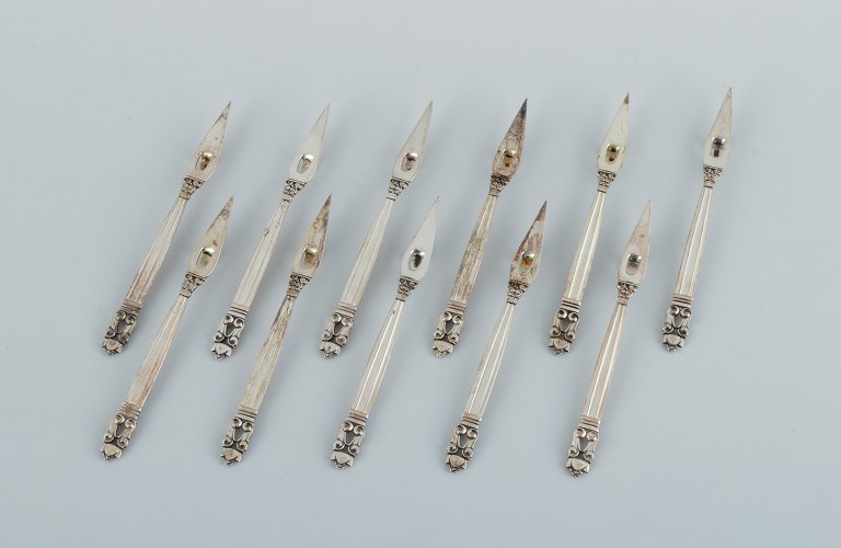 Georg Jensen, a set of eleven rare Acorn cocktail picks.