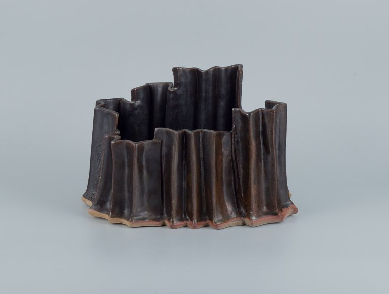 European studio ceramicist. Large unique ceramic vase in high quality, in dark 
brown glaze.