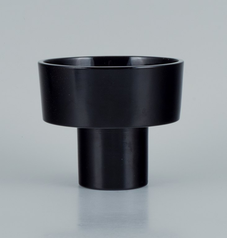 European studio ceramicist. Unique vase in modern shape and black glaze.