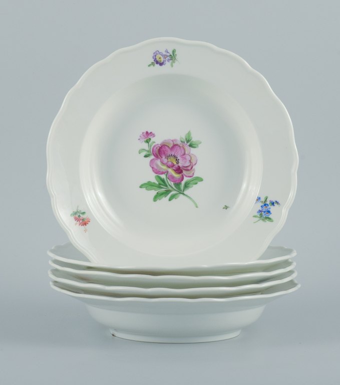 Meissen, Germany.
Six deep plates of porcelain decorated with flowers.