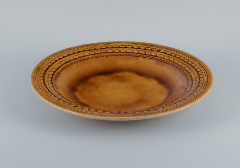 Kähler, HAK, glazed colossal stoneware bowl.
Designed by Nils Kähler. Uranium yellow glaze.