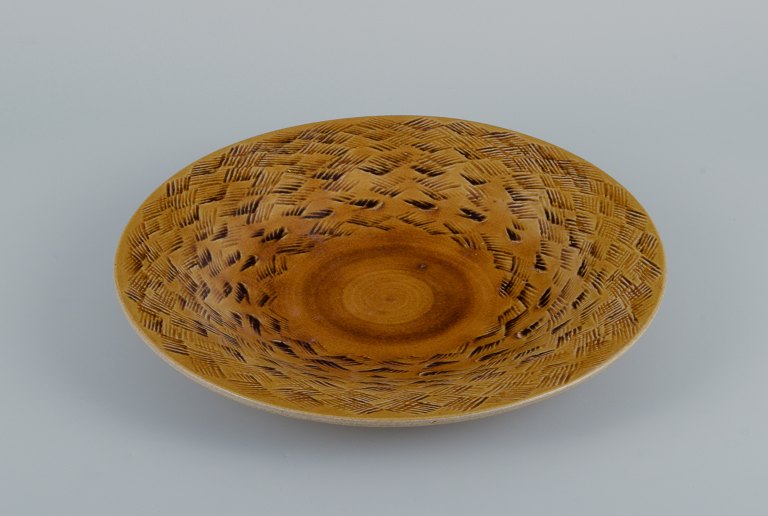 Kähler, HAK, glazed large stoneware bowl.
Designed by Nils Kähler. Uranium yellow glaze.