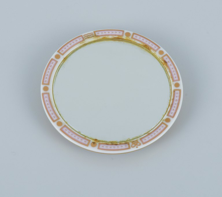 Royal Copenhagen Flora Danica makeup mirror in hand painted porcelain. Floral 
motif and gold decoration.