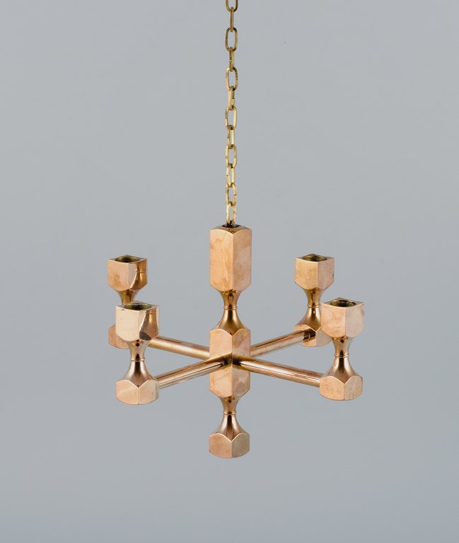 Gusum Metall, Sweden, chandelier in solid brass for four candles.
Swedish design.