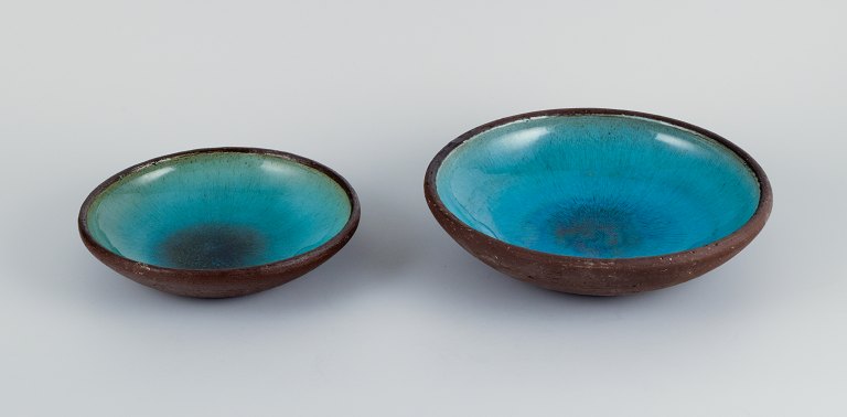 OSA, Denmark.
Two large retro unique ceramic bowls with glaze in turquoise tones.