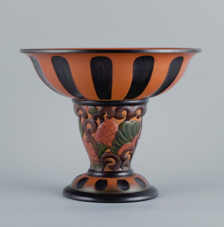 Ipsens, Denmark, Art Nouveau faience compote, decorated with foliage and 
flowers.